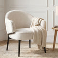 Fauteuil en tissu beige avec pieds en métal noir - ZOE